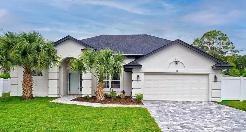 R&K roofing crew on a Palm Coast rooftop